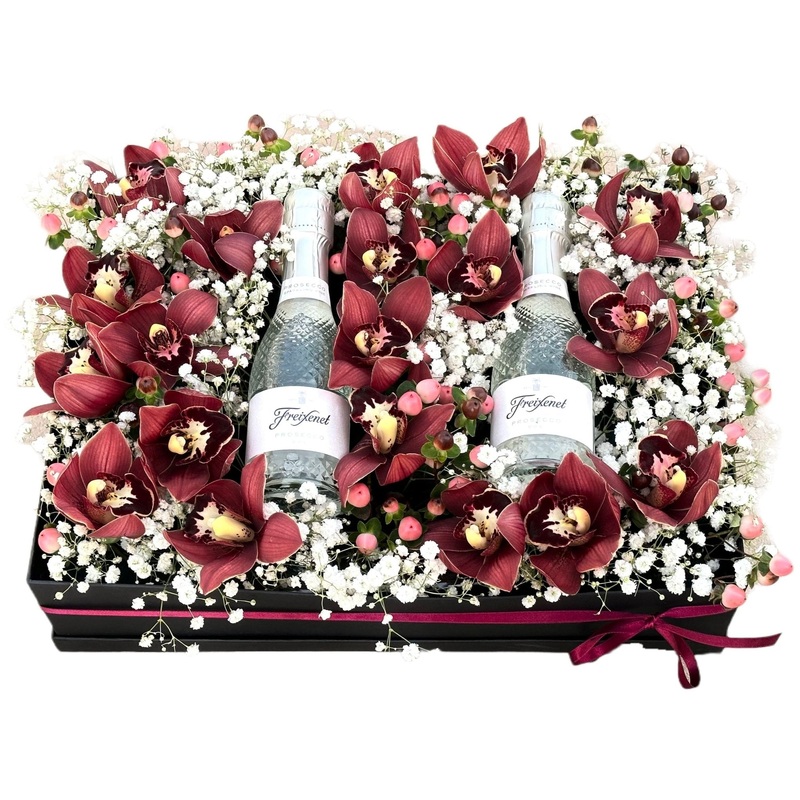 Cymbidium Flowers in a box with Bottles of Prosecco