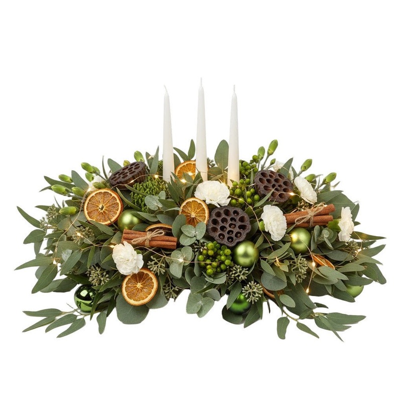 Festive Centerpiece of Green Baubles and White Spray Carnations